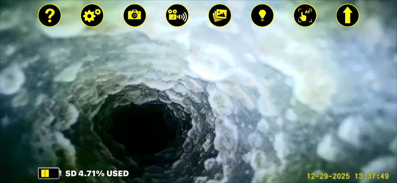 Before dryer vent cleaning — vent packed with lint